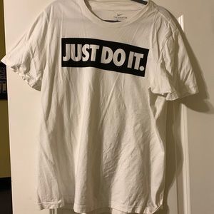 White Nike t-shirt stain on back but can barely see